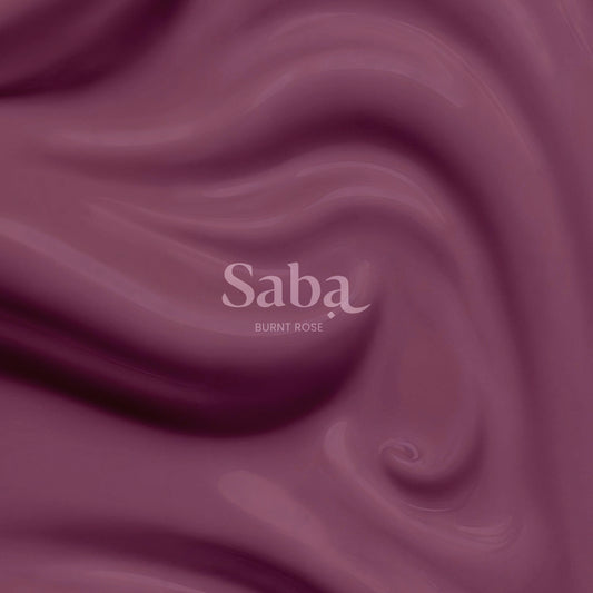 Saba Burnt Rose is a breathable nail polish in a soft, rose petal-inspired pink. Vegan, toxin-free, and beautifully wearable for all skin tones.