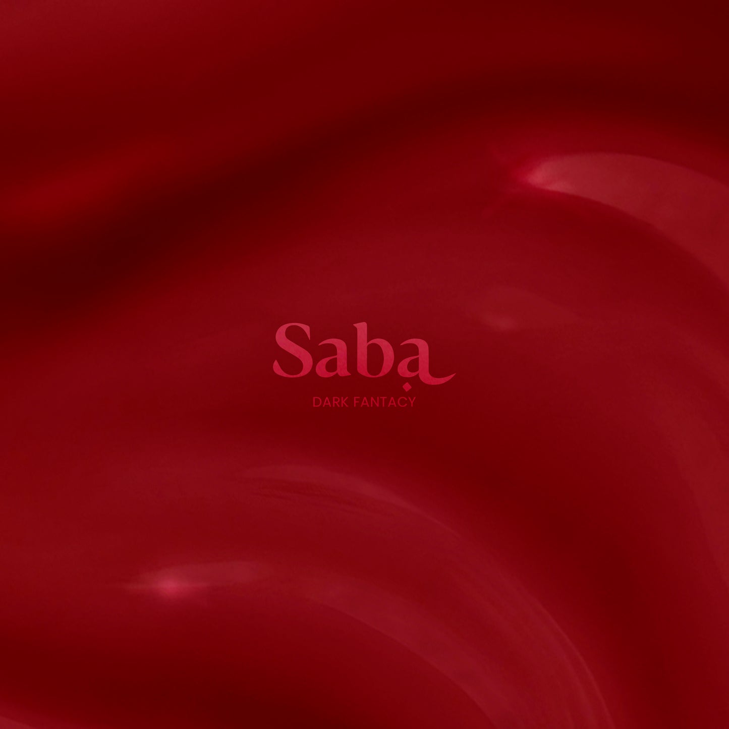 Saba Fantasy Red is a bold ruby-inspired nail polish. Bright, breathable, and toxin-free. Vegan, long-lasting, and stunning on all skin tones.