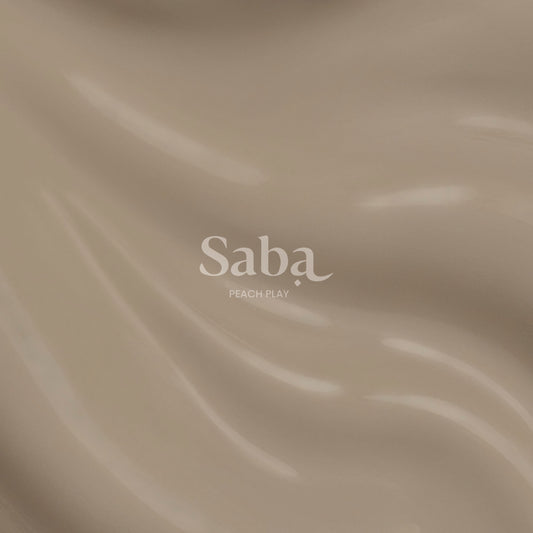 Saba Peach Play is a breathable nude peach nail polish that flatters all skin tones. Toxin-free, vegan, and designed to keep nails healthy and beautiful