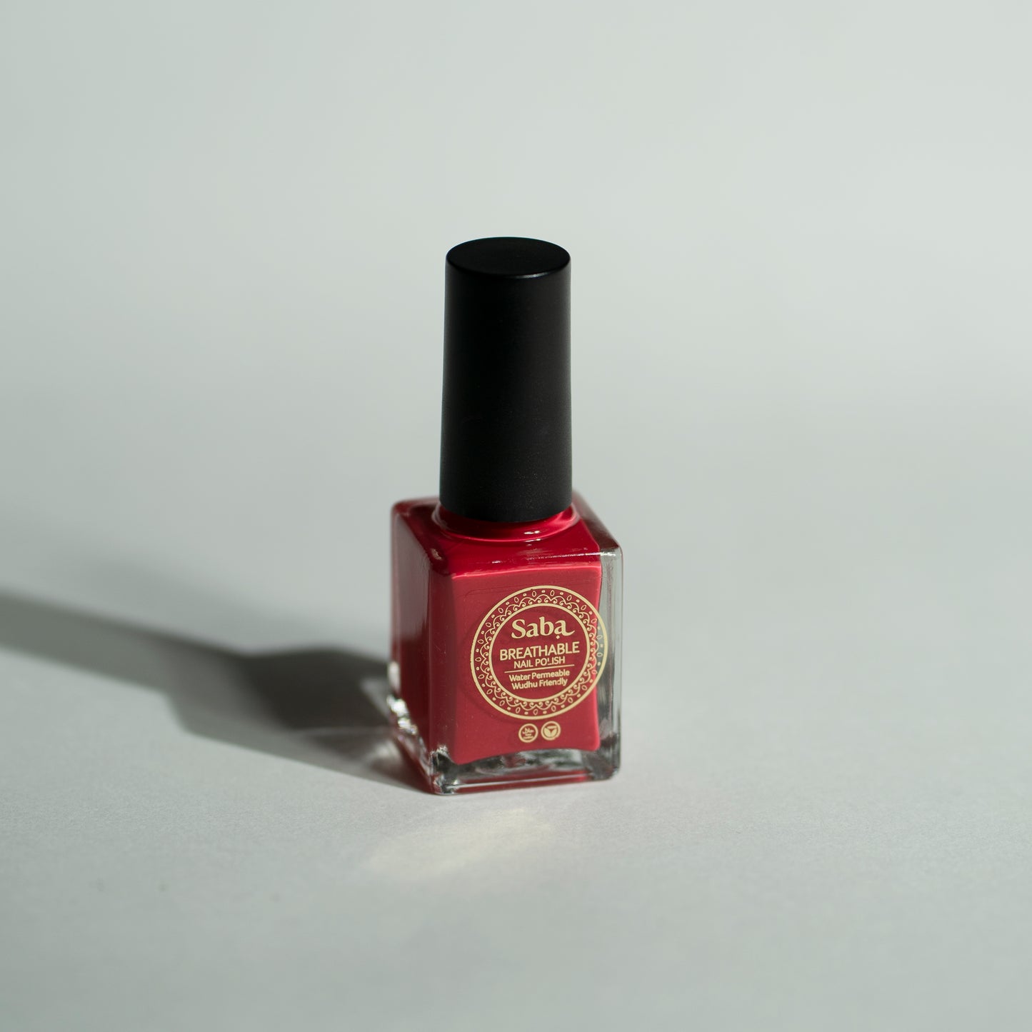 Saba Fantasy Red is a bold ruby-inspired nail polish. Bright, breathable, and toxin-free. Vegan, long-lasting, and stunning on all skin tones.