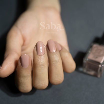 Saba Peach Play is a breathable nude peach nail polish that flatters all skin tones. Toxin-free, vegan, and designed to keep nails healthy and beautiful