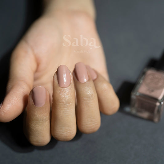 Saba Peach Play is a breathable nude peach nail polish that flatters all skin tones. Toxin-free, vegan, and designed to keep nails healthy and beautiful