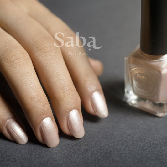 Saba’s breathable Rose Gold nail polish with a glitter finish. Vegan, toxin-free, and designed to keep nails healthy, shiny, and elegant