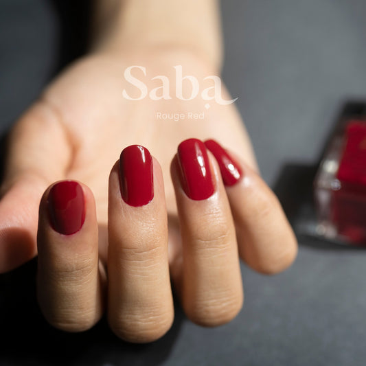 Saba’s breathable Red Rouge nail polish is a bold, bright red for any occasion. Long-lasting, vegan, and toxin-free for healthy, standout nails